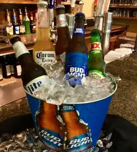 Our ice cold beers include Bud Light, Budweiser, Coors Light, Michelob Ultra, Modelo, Dos XX's, and Corona.