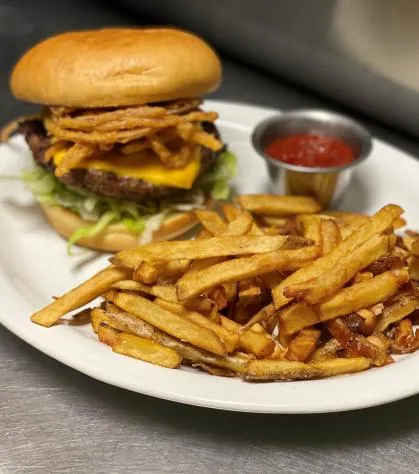 Onion straw burger with hand-cut fries made in house